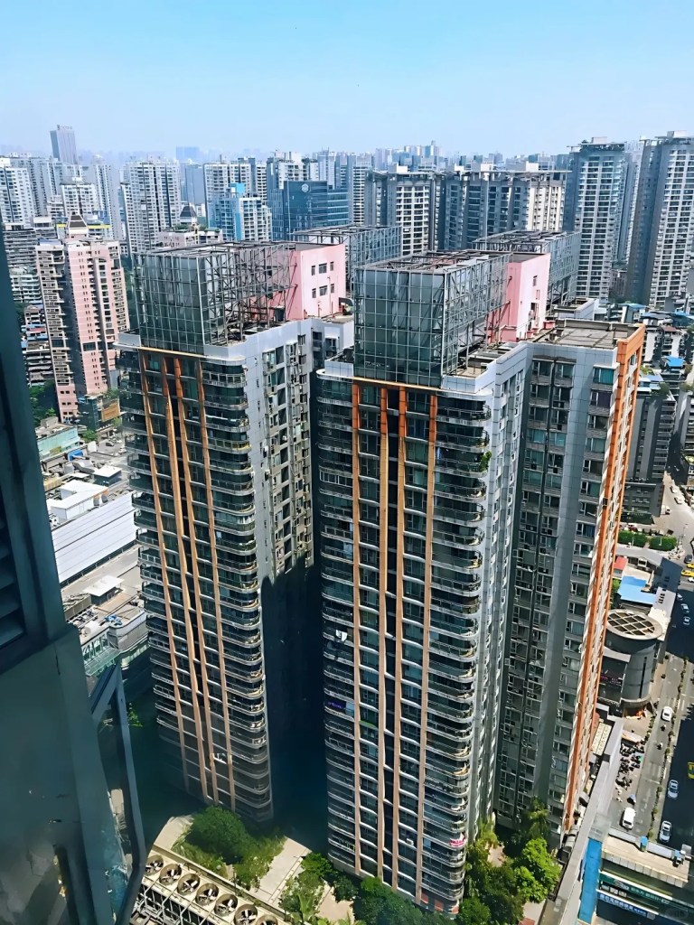 Chongqing Hongding International Building courtyard well, industrial cyber style, magical vertical village view for foreign tourists